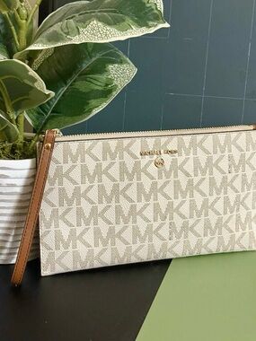Michael Kors Cream Beige Logo Wristlet with Brown Strap